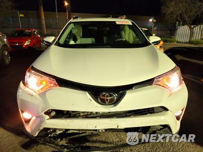 Piąte zdjęcie samochodu w środku: 2018 TOYOTA RAV4 XLE VIN:JTMRFREV6JJ730053 - miniatura