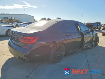 Trzecie zdjęcie samochodu z tyłu: 2019 BMW 740 I VIN:WBA7E2C54KB217669 - miniatura