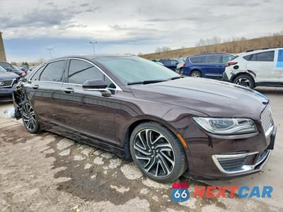 Czwarte zdjęcie samochodu z boku: 2020 LINCOLN MKZ RESERVE VIN:3LN6L5F92LR621972 - miniatura