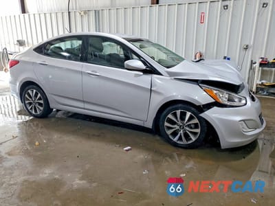 Czwarte zdjęcie samochodu z boku: 2016 HYUNDAI ACCENT SE VIN:KMHCU4AE3GU139606 - miniatura