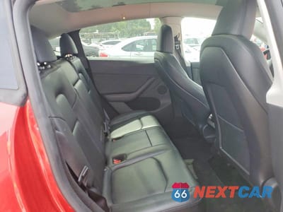 Zdjęcie 11 z 13 samochodu: 2023 TESLA MODEL Y VIN:7SAYGDEE0PA110973 - miniatura