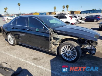 Czwarte zdjęcie samochodu z boku: 2021 MERCEDES-BENZ E 350 VIN:W1KZF8DBXMA999331 - miniatura