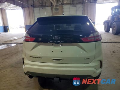 Zdjęcie 6 z 13 samochodu: 2021 FORD EDGE TITANIUM VIN:2FMPK4K9XMBA25631 - miniatura