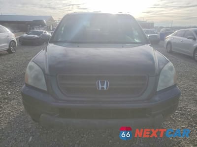 Piąte zdjęcie samochodu w środku: 2004 HONDA PILOT EXL VIN:2HKYF18514H583954 - miniatura
