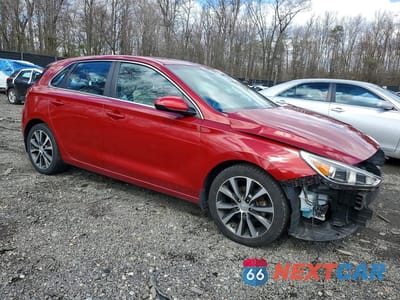 Czwarte zdjęcie samochodu z boku: 2018 HYUNDAI ELANTRA GT BASE VIN:KMHH35LE9JU034619 - miniatura