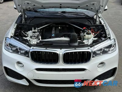 Piąte zdjęcie samochodu w środku: 2018 BMW X6 XDRIVE35I VIN:5UXKU2C52J0Z61909 - miniatura