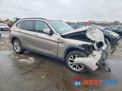 Czwarte zdjęcie samochodu z boku: 2013 BMW X1 XDRIVE28I VIN:WBAVL1C55DVR82432 - miniatura