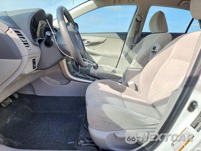 Zdjęcie 7 z 12 samochodu: 2009 TOYOTA COROLLA LE VIN:JTDBL40E699073014 - miniatura