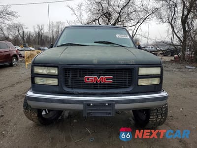 Piąte zdjęcie samochodu w środku: 1999 GMC YUKON VIN:1GKEC13R9XJ755573 - miniatura