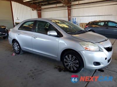 Czwarte zdjęcie samochodu z boku: 2007 TOYOTA YARIS BASE VIN:JTDBT923371055106 - miniatura
