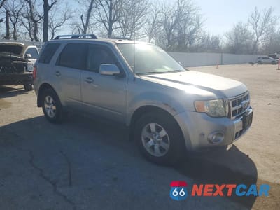 Czwarte zdjęcie samochodu z boku: 2010 FORD ESCAPE HYBRID VIN:1FMCU5K39AKA85444 - miniatura