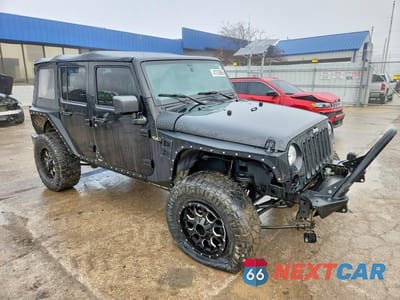 Czwarte zdjęcie samochodu z boku: 2016 JEEP WRANGLER UNLIMITED SPORT VIN:1C4BJWDG9GL307711 - miniatura