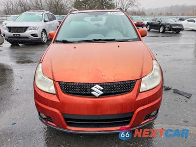 Piąte zdjęcie samochodu w środku: 2010 SUZUKI SX4 TOURING VIN:JS2YB5A77A6310673 - miniatura