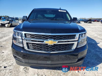 Piąte zdjęcie samochodu w środku: 2017 CHEVROLET TAHOE C1500 LT VIN:1GNSCBKCXHR318841 - miniatura