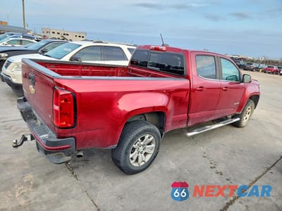Trzecie zdjęcie samochodu z tyłu: 2018 CHEVROLET COLORADO LT VIN:1GCGSCEN9J1147136 - miniatura