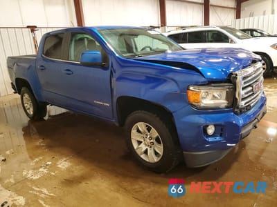 Czwarte zdjęcie samochodu z boku: 2018 GMC CANYON SLE VIN:1GTG6CEN5J1117989 - miniatura