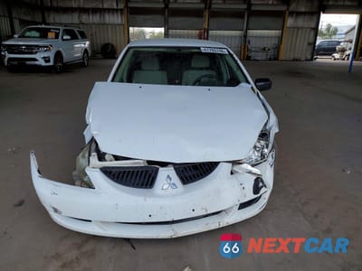 Piąte zdjęcie samochodu w środku: 2004 MITSUBISHI LANCER ES VIN:JA3AJ26E04U035084 - miniatura