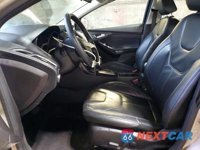 Zdjęcie 7 z 13 samochodu: 2018 FORD FOCUS TITANIUM VIN:1FADP3N27JL232609 - miniatura