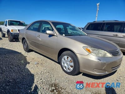 Czwarte zdjęcie samochodu z boku: 2003 TOYOTA CAMRY LE VIN:JTDBE32K630184021 - miniatura