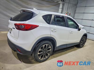 Trzecie zdjęcie samochodu z tyłu: 2016 MAZDA CX-5 GT VIN:JM3KE4DY1G0670014 - miniatura