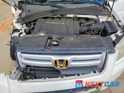 Zdjęcie 12 z 14 samochodu: 2007 HONDA PILOT EXL VIN:5FNYF18597B030634 - miniatura