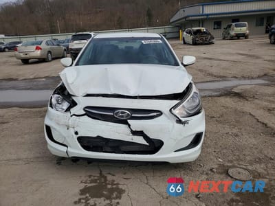Piąte zdjęcie samochodu w środku: 2015 HYUNDAI ACCENT GLS VIN:KMHCT4AE6FU820909 - miniatura