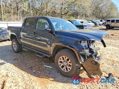 Czwarte zdjęcie samochodu z boku: 2018 TOYOTA TACOMA SR5 V6 VIN:3TMCZ5AN0JM180802 - miniatura