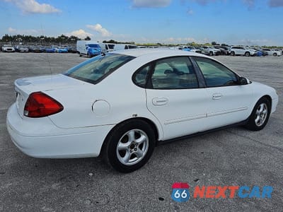 Trzecie zdjęcie samochodu z tyłu: 2002 FORD TAURUS SE VIN:1FAFP53U82A194863 - miniatura