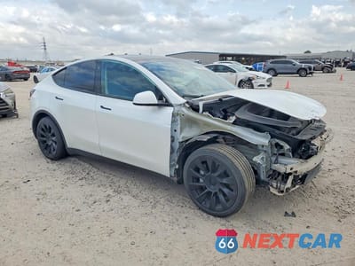 Czwarte zdjęcie samochodu z boku: 2022 TESLA MODEL Y VIN:7SAYGDEE8NA010875 - miniatura