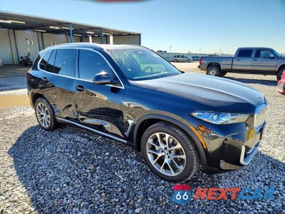 Czwarte zdjęcie samochodu z boku: 2026 BMW X5 XDRIVE40I VIN:5UX23EU05T9090929 - miniatura