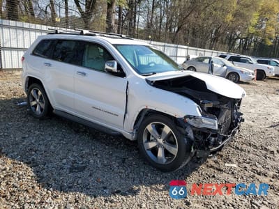 Czwarte zdjęcie samochodu z boku: 2016 JEEP GRAND CHEROKEE OVERLAND VIN:1C4RJFCT0GC490638 - miniatura