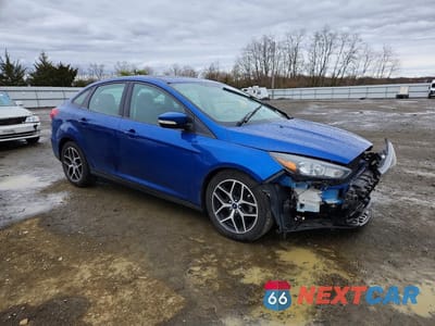 Czwarte zdjęcie samochodu z boku: 2018 FORD FOCUS SEL VIN:1FADP3H27JL254668 - miniatura