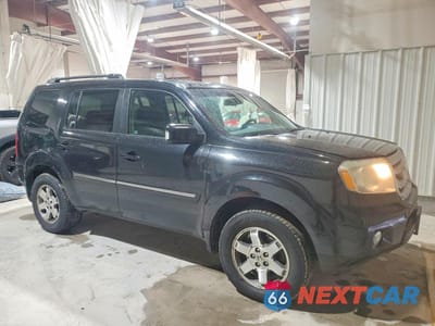 Czwarte zdjęcie samochodu z boku: 2010 HONDA PILOT TOURING VIN:5FNYF4H8XAB011190 - miniatura