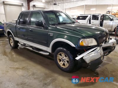 Czwarte zdjęcie samochodu z boku: 2002 FORD F150 SUPERCREW VIN:1FTRW08LX2KE12079 - miniatura