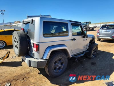 Trzecie zdjęcie samochodu z tyłu: 2014 JEEP WRANGLER SAHARA VIN:1C4AJWBG9EL175612 - miniatura