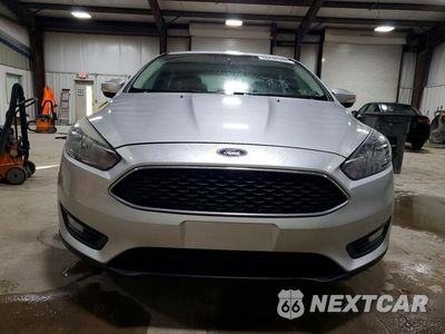 Piąte zdjęcie samochodu w środku: 2016 FORD FOCUS VIN:1FADP3F25GL215783 - miniatura