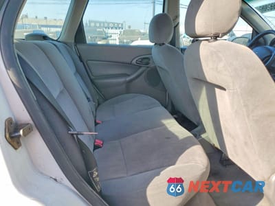 Zdjęcie 10 z 13 samochodu: 2001 FORD FOCUS SE VIN:1FAFP36351W269138 - miniatura