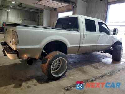 Trzecie zdjęcie samochodu z tyłu: 2003 FORD F250 SUPER DUTY VIN:1FTNW21P83ED22064 - miniatura