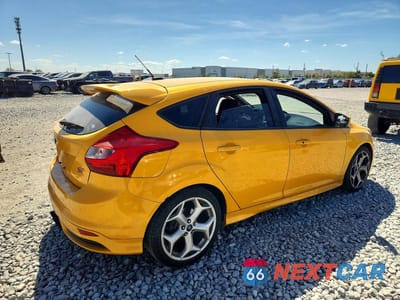 Trzecie zdjęcie samochodu z tyłu: 2013 FORD FOCUS ST VIN:1FADP3L94DL362674 - miniatura