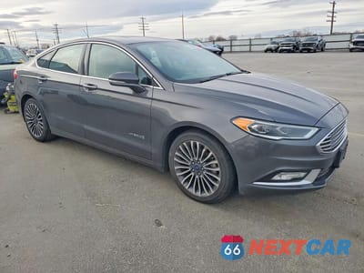Czwarte zdjęcie samochodu z boku: 2017 FORD FUSION TITANIUM HEV VIN:3FA6P0RUXHR295850 - miniatura
