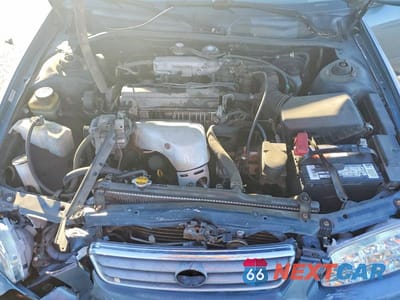 Zdjęcie 11 z 12 samochodu: 2000 TOYOTA CAMRY LE VIN:JT2BG22K2Y0408745 - miniatura