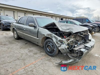 Czwarte zdjęcie samochodu z boku: 2003 MERCURY GRAND MARQUIS LS VIN:2MEFM75W83X672719 - miniatura