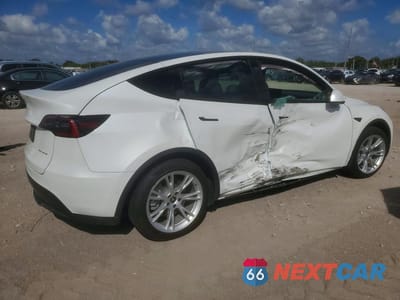 Trzecie zdjęcie samochodu z tyłu: 2022 TESLA MODEL Y VIN:7SAYGAEE2NF316438 - miniatura