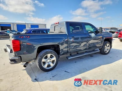 Trzecie zdjęcie samochodu z tyłu: 2018 CHEVROLET SILVERADO K1500 LT VIN:3GCUKREC3JG165413 - miniatura