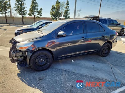 2009 TOYOTA YARIS BASE JTDBT903094054287 - główne zdjęcie licytacji z USA - miniatura