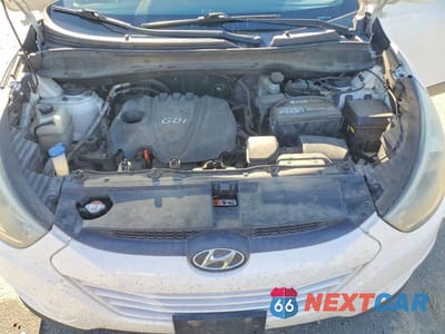 Zdjęcie 12 z 13 samochodu: 2014 HYUNDAI TUCSON VIN:KM8JU3AG0EU907431 - miniatura