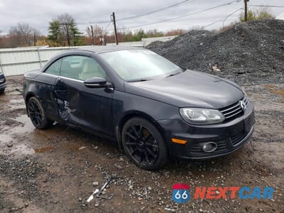Czwarte zdjęcie samochodu z boku: 2015 VOLKSWAGEN EOS LUX VIN:WVWFW8AHXFV002670 - miniatura