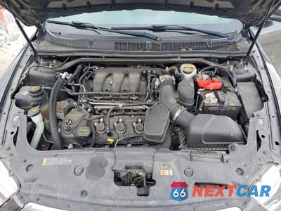 Zdjęcie 11 z 12 samochodu: 2018 FORD TAURUS SEL VIN:1FAHP2E81JG119599 - miniatura