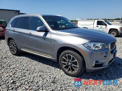 Czwarte zdjęcie samochodu z boku: 2017 BMW X5 XDRIVE35I VIN:5UXKR0C51H0U51731 - miniatura