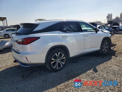 Trzecie zdjęcie samochodu z tyłu: 2018 LEXUS RX 350L BASE VIN:JTJDZKCA3J2007745 - miniatura